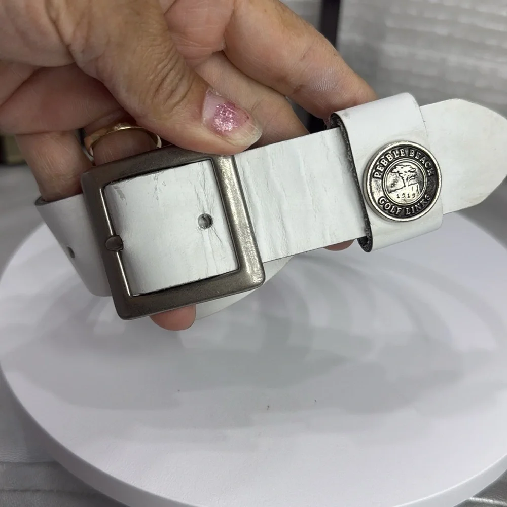 (H)Two Pebble Beach boys' leather belts with black and white metal silve buckles